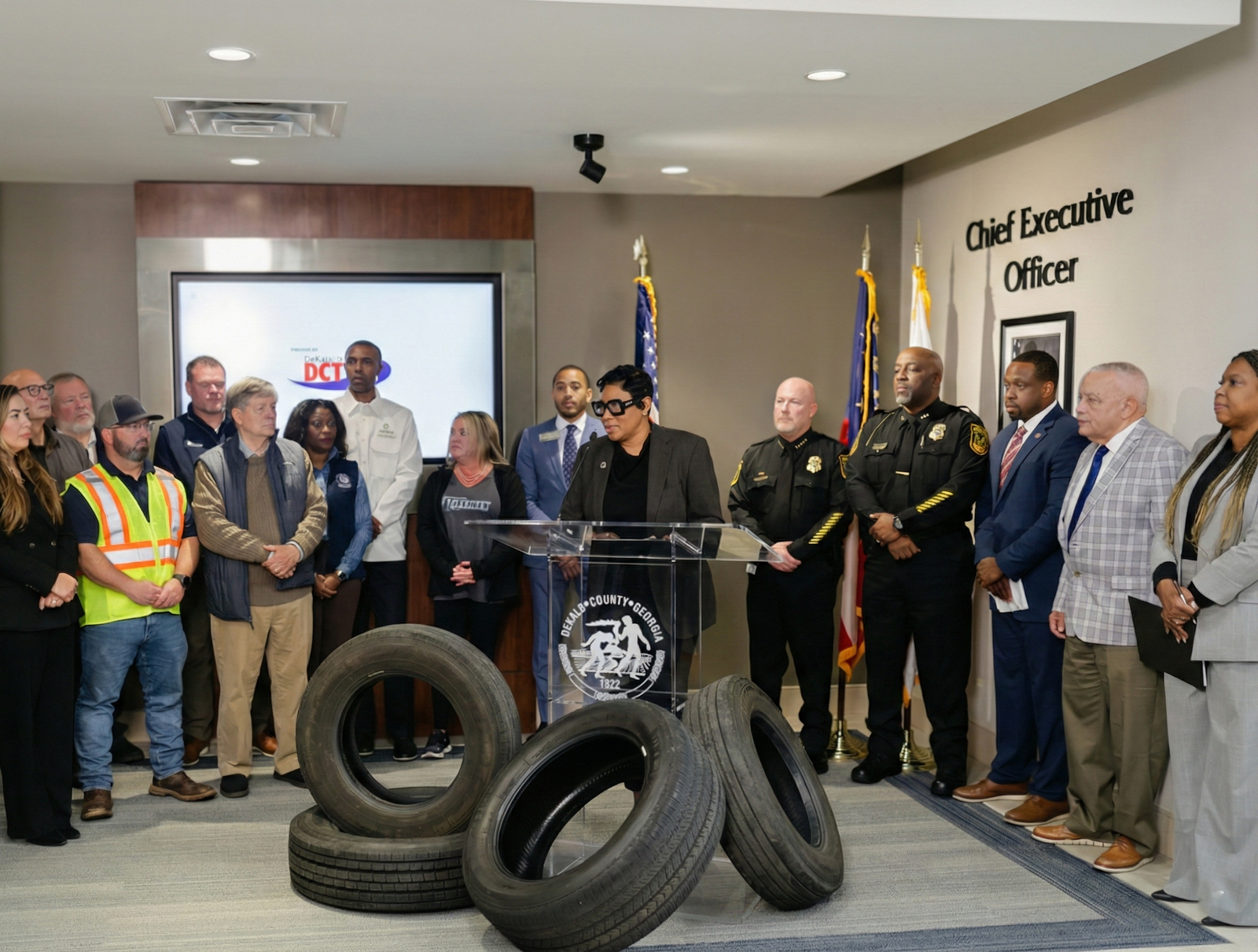 Official press conference regarding tire recycling or environmental initiatives.